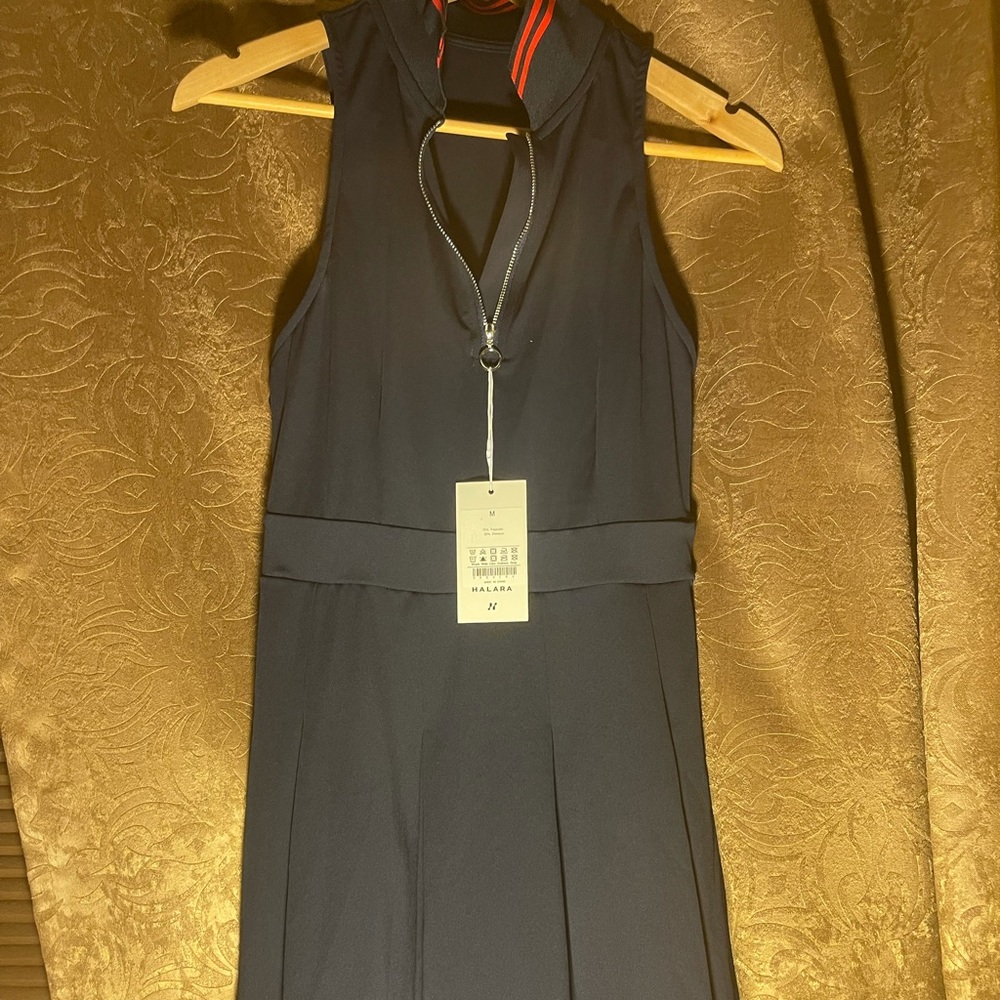 Brand new Halara Tennis/Golf dress. True Navy blue. Medium size. Flowy dress.